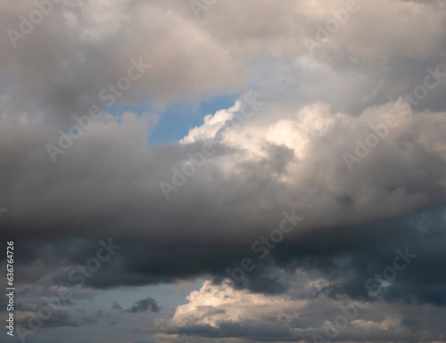 Stormy sky with white and grey clouds background, beautiful heaven photo