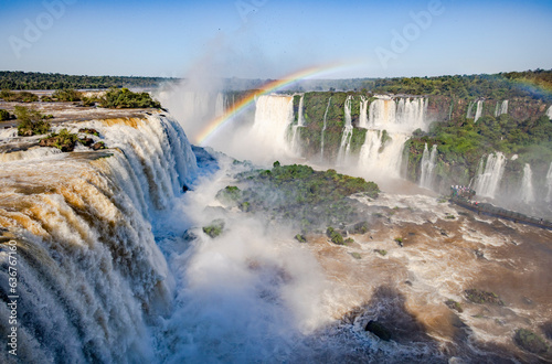 Fototapeta Naklejka Na Ścianę i Meble -  Perfect rainbow over Iguazu Waterfalls, one of the new seven natural wonders of the world in all its beauty viewed from the Brazilian side - traveling South America 
