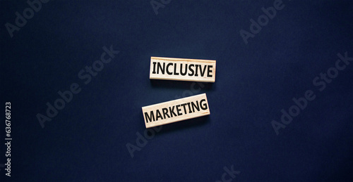 Inclusive marketing symbol. Concept words Inclusive marketing on beautiful wooden block. Beautiful black table black background. Business inclusive marketing concept. Copy space.