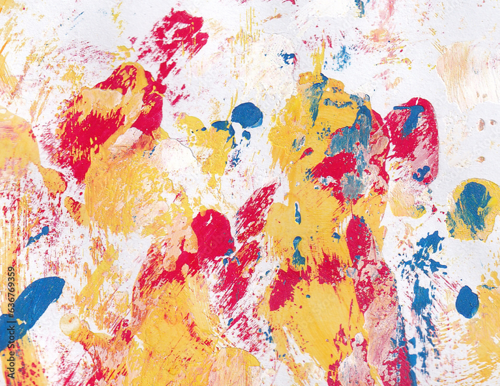 Colorful paint smear background. Red, yellow, and blue color combination. Abstract and textured contemporary painting.