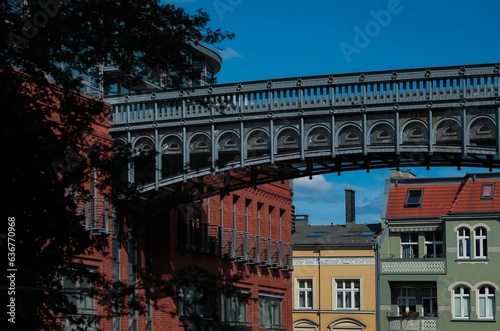 Majestic bridge on the brown brick building of the Stary Browar shopping center in Poznan, Poland