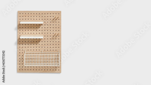 Closeup of wooden pegboard isolated on white background. photo