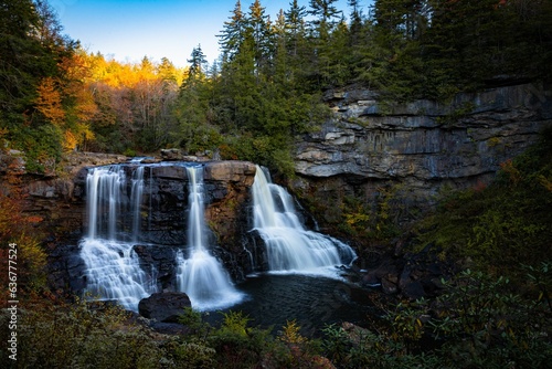 Awe-inspiring landscape featuring Blackwater Falls surrounded by lush vegetation. West Virginia.