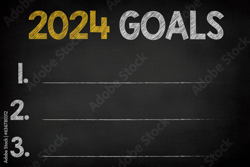 2024 Goals new year on chalkboard background