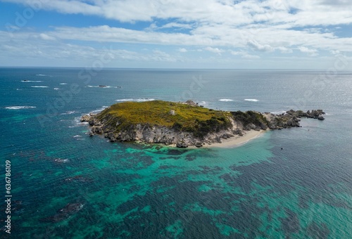 An aerial shot of an island in the ocean