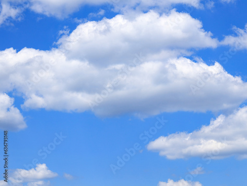 Beautyful blue sky with white clouds. Blue sky with clouds background. Calm bright day in summer.