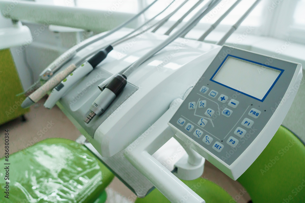 Modern dental office. Dentist's tools for dental treatment. Workplace of a dentist in a clinic Modern dental office. Dentist's tools for dental treatment. Workplace of a dentist in a clinic
