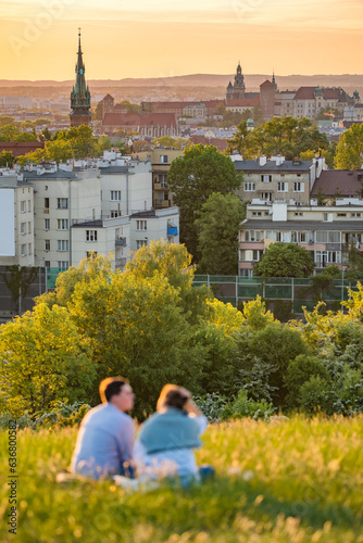 Krakus Mound with sunset view of Krakow old town, Poland. photo