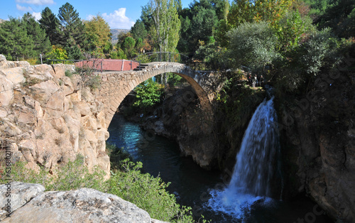 Clandiras Bridge, located in Usak, Turkey, was built during the Roman period. There is a waterfall right next to it.