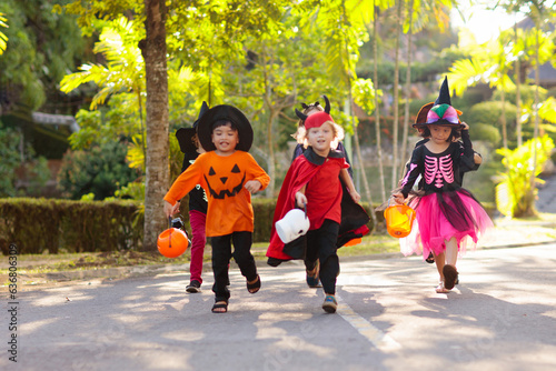 Kids trick or treat. Halloween fun for children.