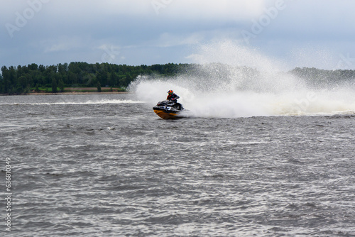 jet ski on the river in Latvia, water splashes, competitions on the river 2 photo