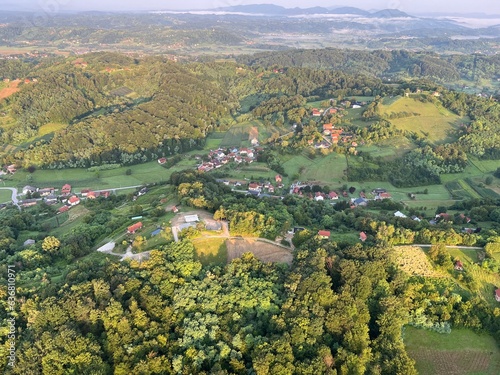 View of forests, fields, villages and Zagorje hills, during a panoramic balloon flight over Croatian Zagorje - Croatia (Panoramski let balonom iznad Hrvatskog zagorja - Hrvatska) photo