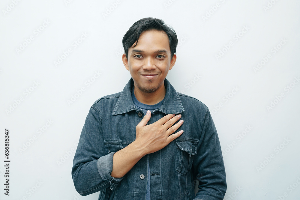 Portrait of Indonesian Asian man showing please sign language for deafness gesture. Isolated white background