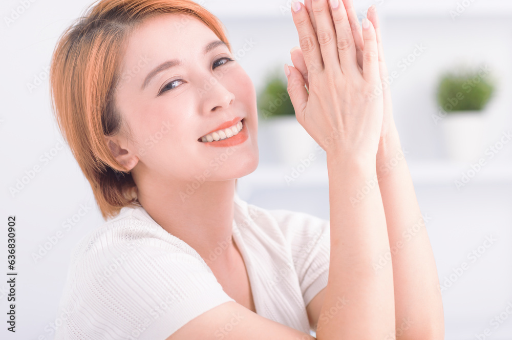 Happy asian young woman in living room Happy asian young woman in living room