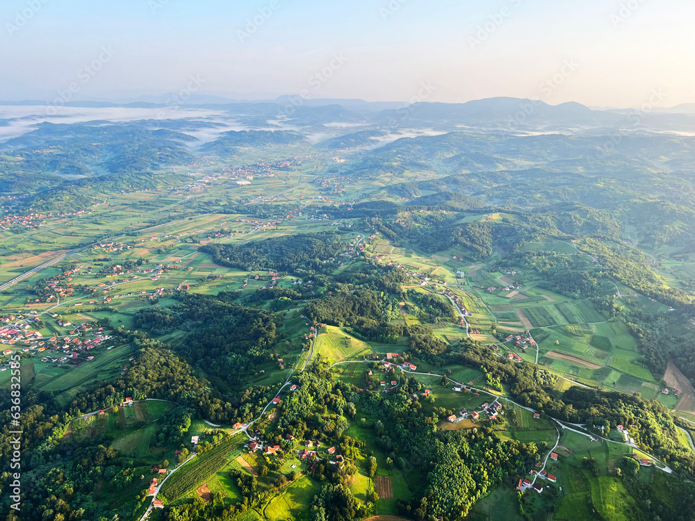 View of forests, fields, villages and Zagorje hills, during a panoramic balloon flight over Croatian Zagorje - Croatia (Panoramski let balonom iznad Hrvatskog zagorja - Hrvatska)