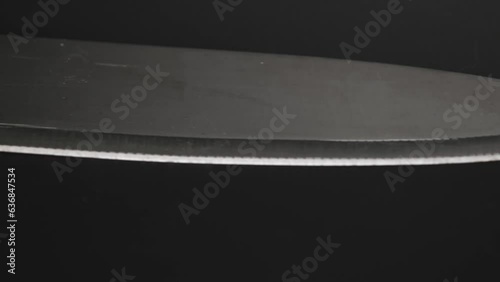 Kitchen knife. Large sharp knife with stainless steel handle isolated on white background.