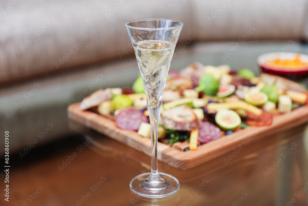 champagne and cup glass embodies celebration, luxury, and toasts, symbolizing joyous moments and achievements in elegant social gatherings champagne and cup glass embodies celebration, luxury, and toasts, symbolizing joyous moments and achievements in elegant social gatherings