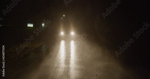 Cars driving in the rain at night 15