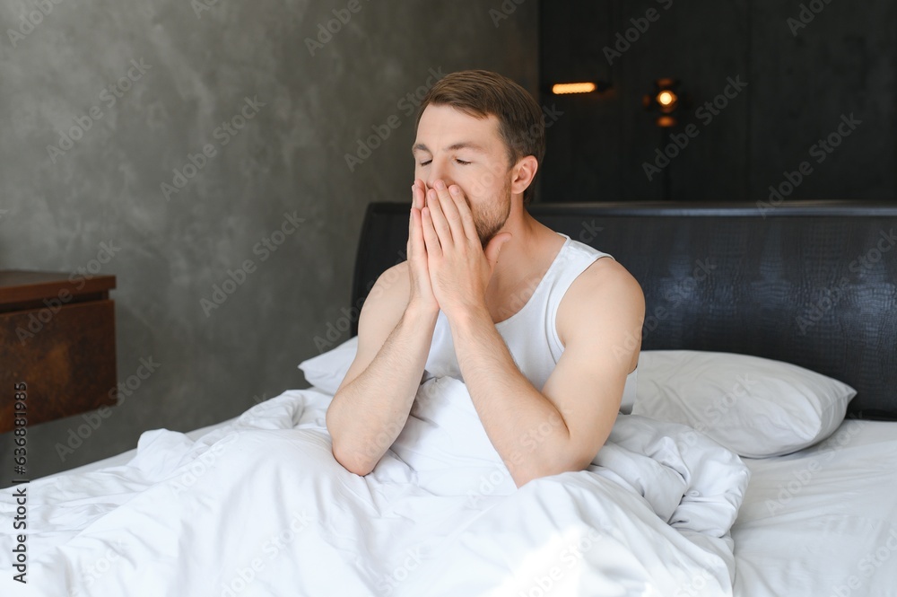 Cheerful Man Waking Up Lying In Cozy Bed At Home On Weekend Morning. Healthy Sleep Concept Cheerful Man Waking Up Lying In Cozy Bed At Home On Weekend Morning. Healthy Sleep Concept