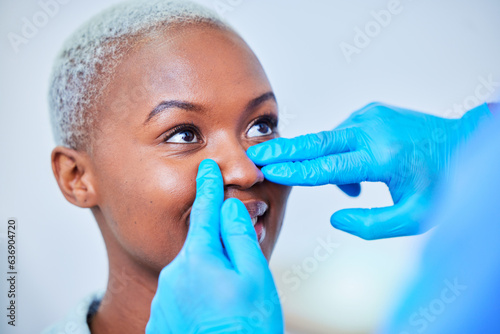 Doctor hands  woman and rhinoplasty for nose job  cosmetics and aesthetic transformation or change. Medical  surgeon and plastic surgery of african patient or client face  dermatology help or support