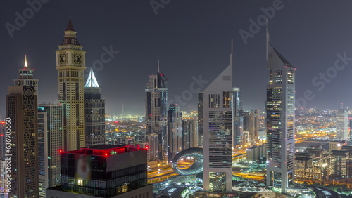 Skyscrapers on Sheikh Zayed Road and DIFC all night timelapse in Dubai, UAE.