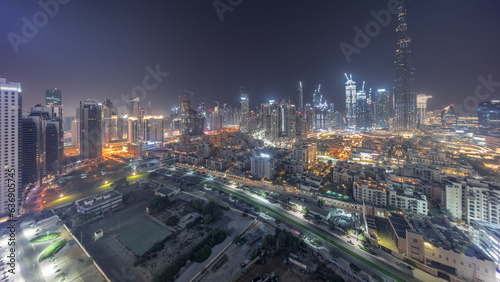 Dubai Downtown all night timelapse with tallest skyscraper and other towers