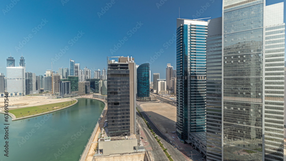Cityscape skyscrapers of Dubai Business Bay with water canal aerial timelapse. Cityscape skyscrapers of Dubai Business Bay with water canal aerial timelapse.