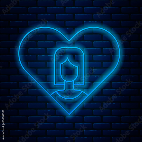 Glowing neon line Heart with female icon isolated on brick wall background. Venus symbol. The symbol for a female organism or woman. Vector