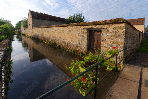 Orvanne river in Flagy village. French Gatinais Regional Nature Park photo