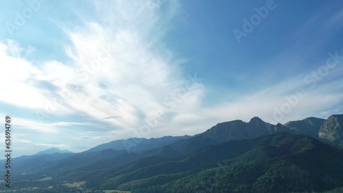 Hyperlapse-panorama of floating clouds over the mountains