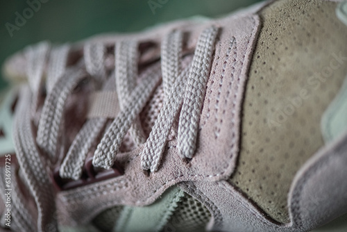 Fragment of original suede sports sneakers.