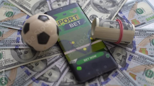 Monitor with champion cups, sport balls and gold coins in dark scene with neon rhombus frames and hologram of digital rings