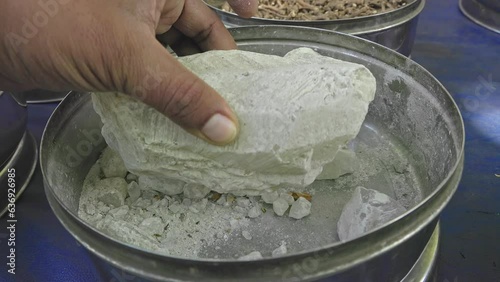 Ayurvedic healing stones or crystals displayed at a roadside herbal stall photo