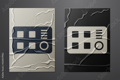 White Drum machine icon isolated on crumpled paper background. Musical equipment. Paper art style. Vector