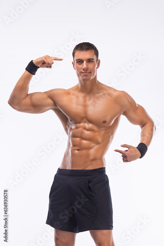 Fitness expert. Think with your head about your body. You are what you eat. Personal trainer and motivator. Muscular man athlete with glasses.