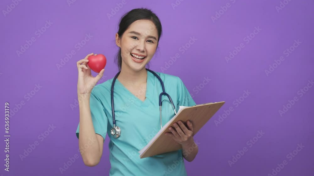 Young asian woman surgeon happy smile indicate finger empty space advert advice isolated color background. Young asian woman surgeon happy smile indicate finger empty space advert advice isolated color background.