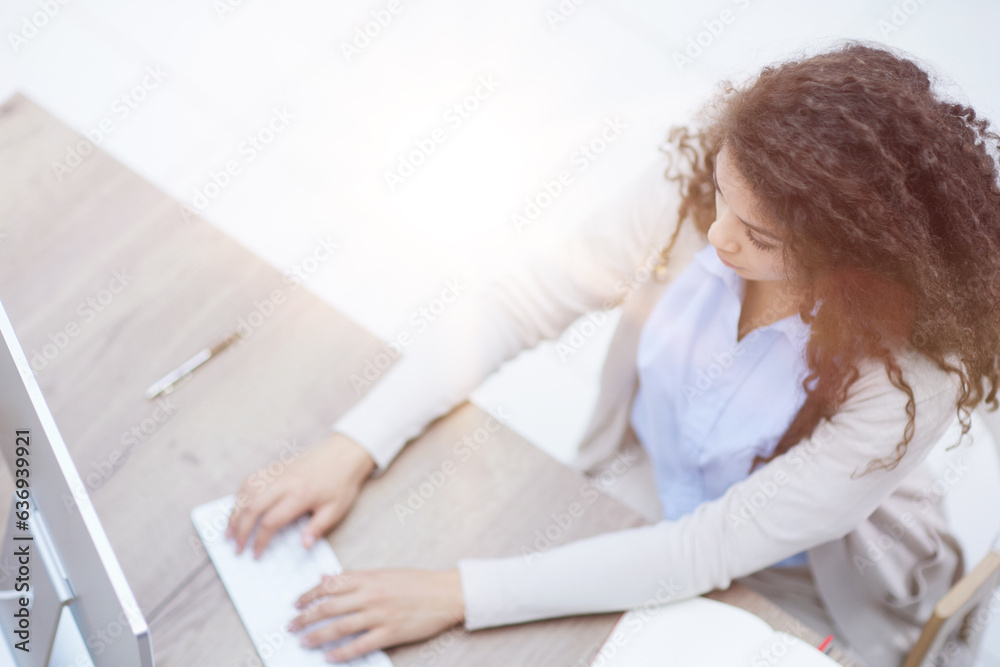 Successful female grapic designer watching tutorial about creative ideas at laptop Successful female grapic designer watching tutorial about creative ideas at laptop