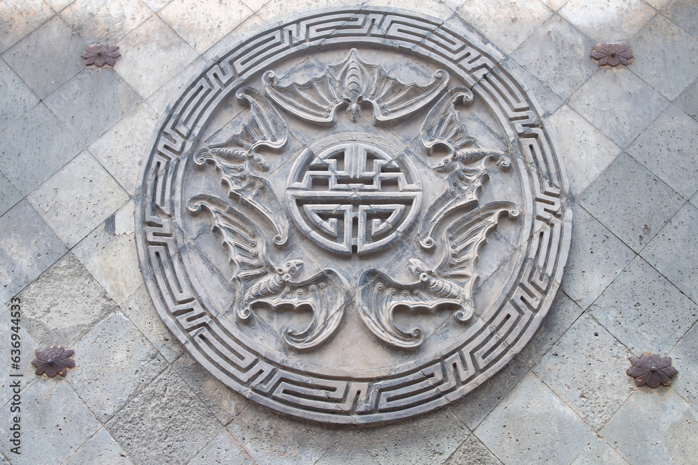 stone carving with bats horizontal composition stone carving with bats horizontal composition