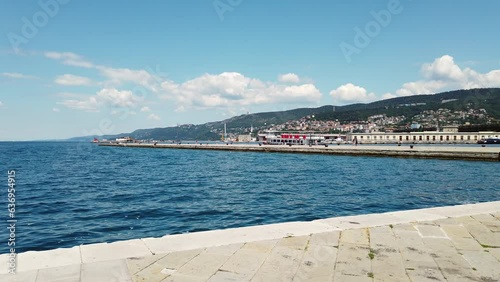 Seafront of Trieste, Italy, next to Audace pier, in a sunny summer morning