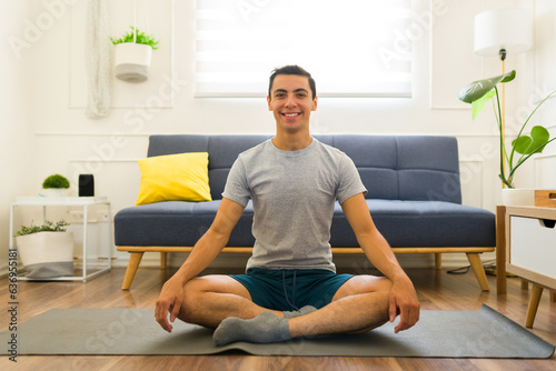 Caucasian man doing yoga using a mock-up t-shirt