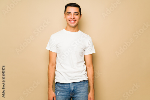 Handsome man with a white mockup t-shirt