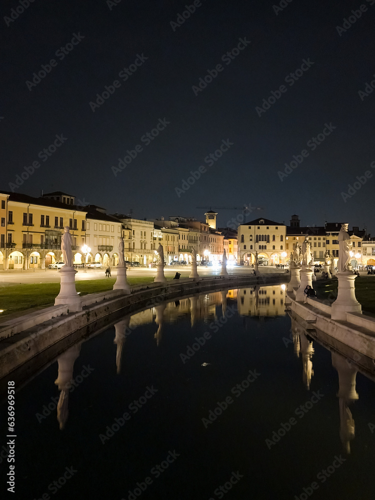 Padua, Italy - May 06, 2023: In photo Prato della Valle, the second largest square in Europe on a perfect night, there are people.