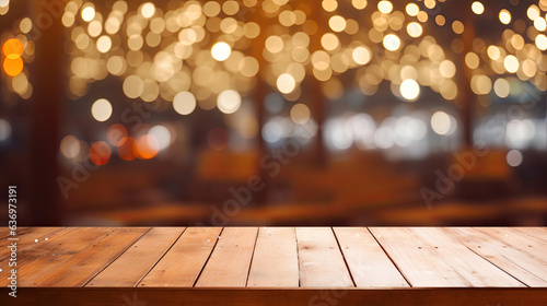 Background Image of wooden table in front of abstract blurred restaurant lights