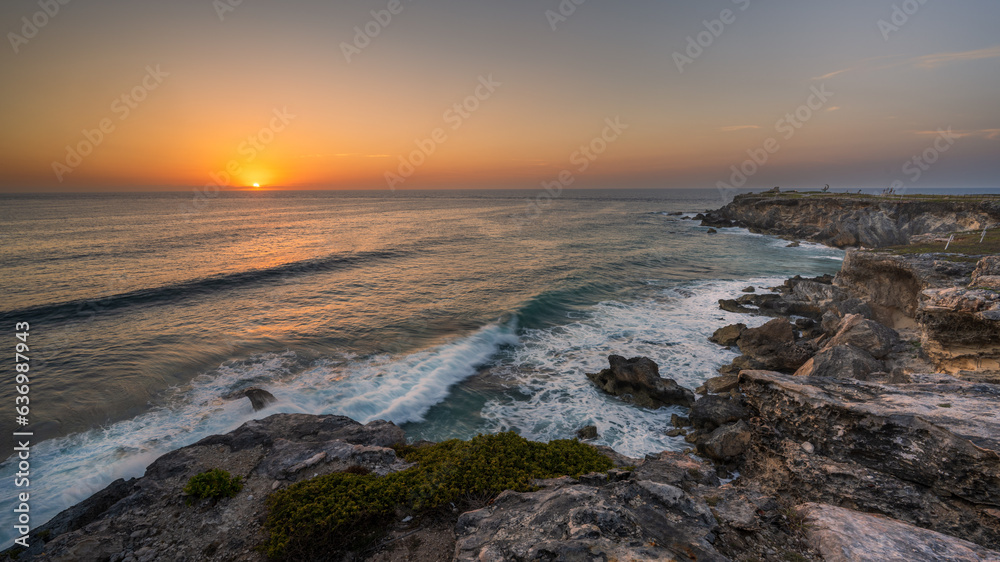 morning light on rocky cliff ocean morning light on rocky cliff ocean