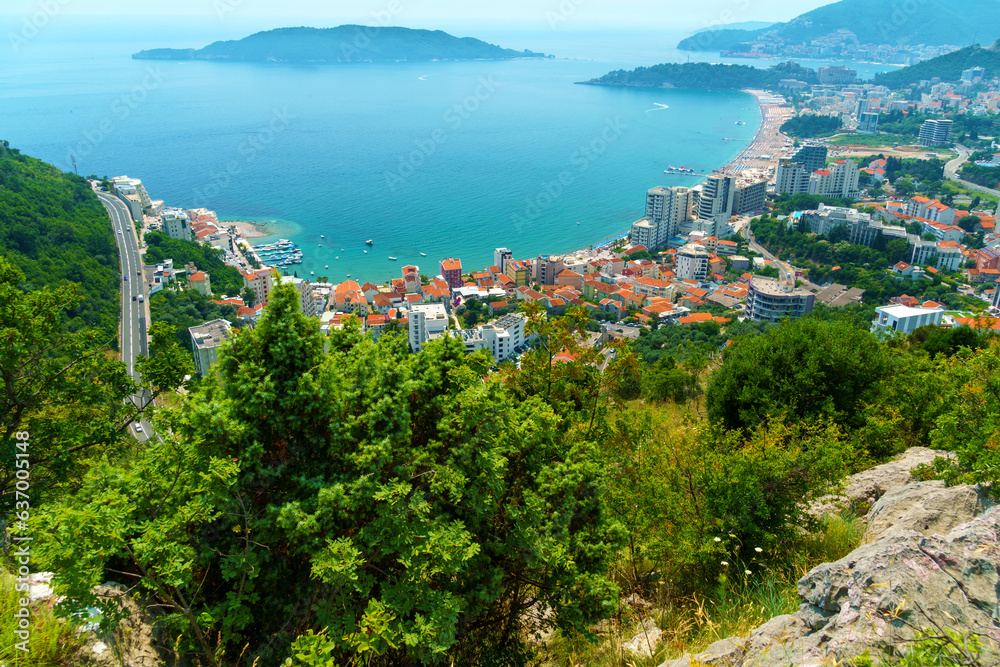 aerial view of the city on the seashore and mountains, panorama of the resorts of Becici and Budva in Montenegro, Adriatic sea, beaches, islands, tourism and travel, summer traveling aerial view of the city on the seashore and mountains, panorama of the resorts of Becici and Budva in Montenegro, Adriatic sea, beaches, islands, tourism and travel, summer traveling