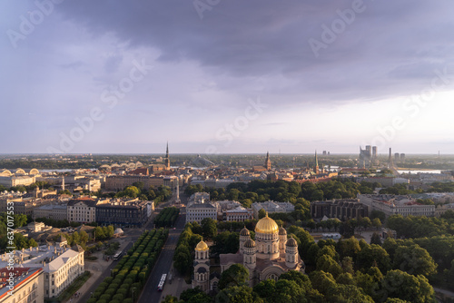 Fototapeta Naklejka Na Ścianę i Meble -  Skyline of the city of Riga seen from the terrace of a hotel, at sunset.