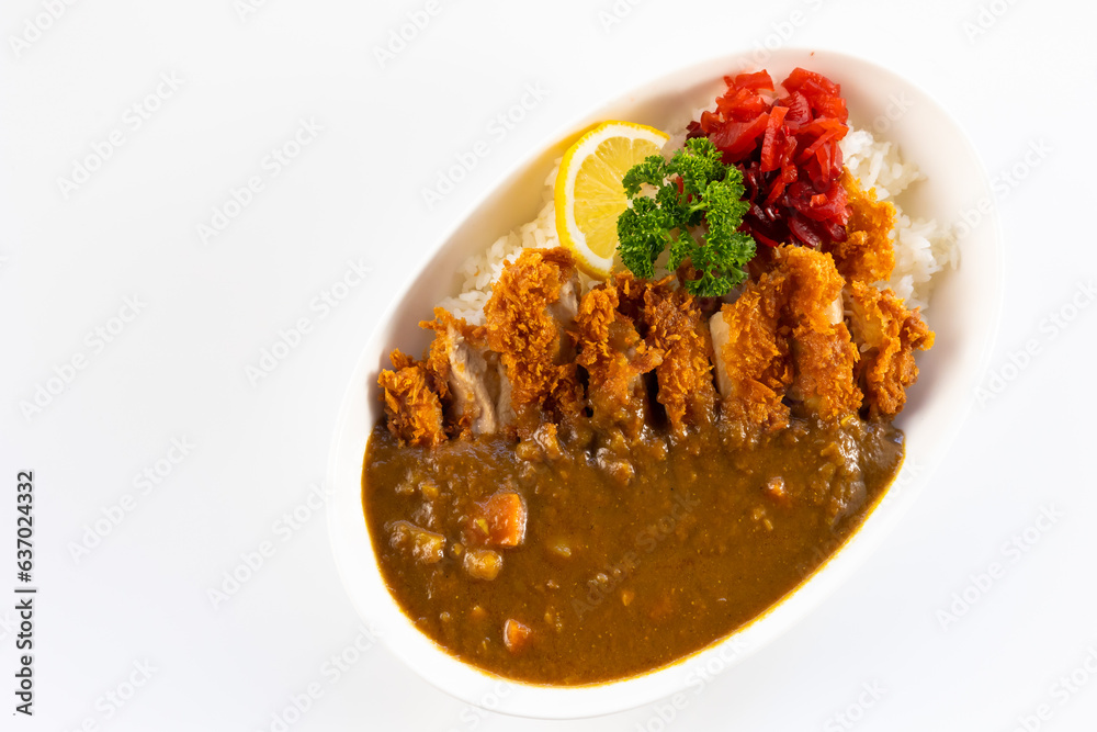 Curry topped with fried pork. spicy curry meat food in plate with rice. Japanese food on restaurant table Curry topped with fried pork. spicy curry meat food in plate with rice. Japanese food on restaurant table