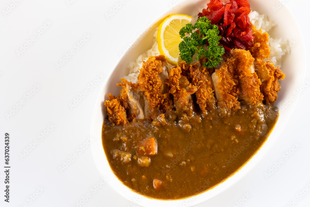 Curry topped with fried pork. spicy curry meat food in plate with rice. Japanese food on restaurant table Curry topped with fried pork. spicy curry meat food in plate with rice. Japanese food on restaurant table