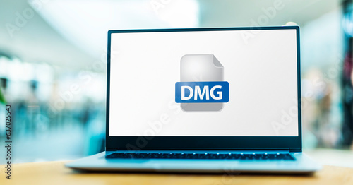 Laptop computer displaying the icon of dmg file photo