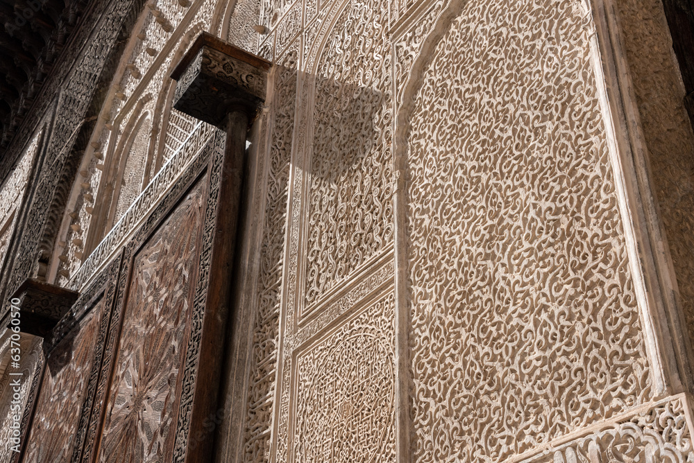 Φωτογραφία Traditional oriental facade at the courtyard of madrasa Bou Inaniya in the medin